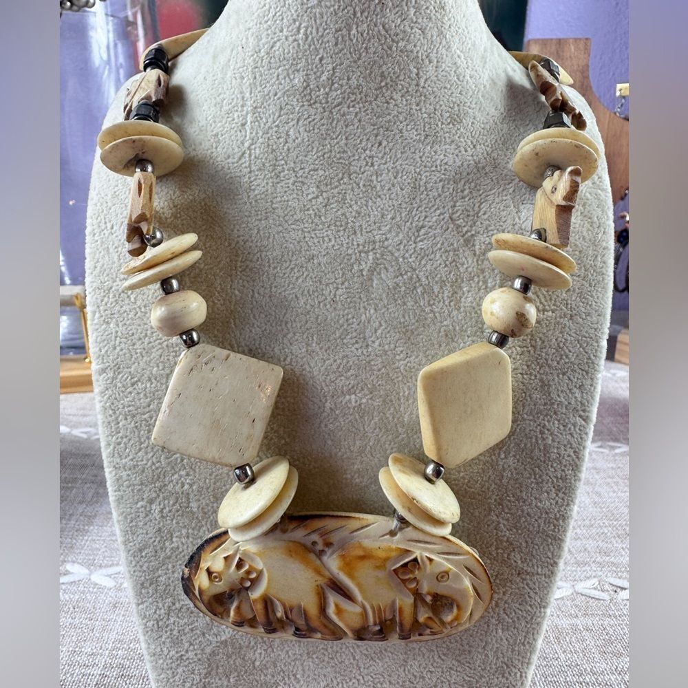 Carved Bone Elephant Pendant Necklace